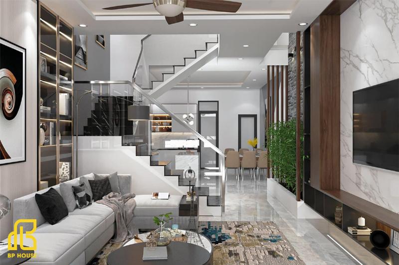 Cầu thang xoắn ốc hiện đại tiết kiệm diện tích cho nhà hẹp 3m, với bậc gỗ và lan can kim loại mảnh mai.