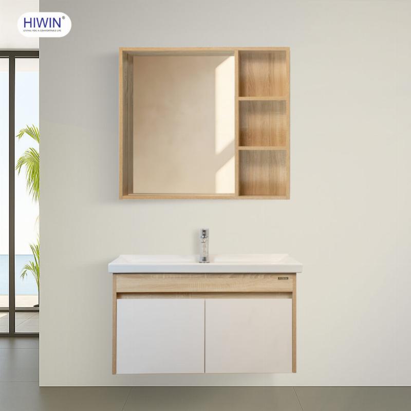 Một chiếc kệ nhà tắm được sắp xếp gọn gàng với các lọ đựng cùng tông màu và giỏ đựng đồ nhỏ, tạo nên vẻ đẹp thống nhất và sạch sẽ.