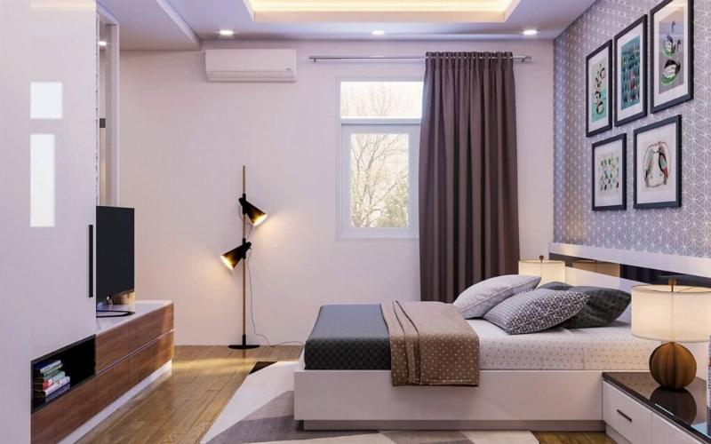 Mẫu trần thạch cao phòng ngủ đơn giản, phẳng kết hợp đèn downlight và hệ thống đèn hắt ánh sáng dịu nhẹ.