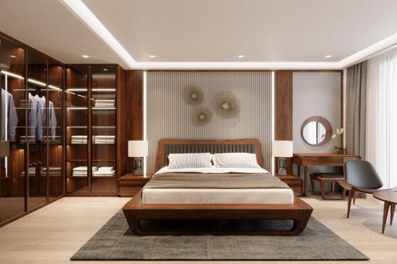 Hình trang trí phòng ngủ đơn giản với gam màu trung tính và nội thất gỗ tự nhiên, tạo không gian ấm cúng