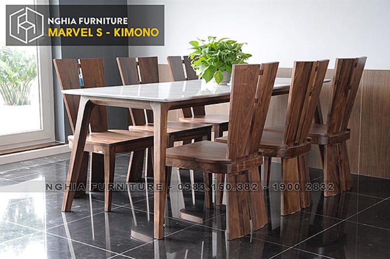 Cận cảnh bề mặt đá sang trọng của bộ bàn ăn 8 ghế, nổi bật với đường vân đá tự nhiên tinh tế và ghế bọc da đẳng cấp