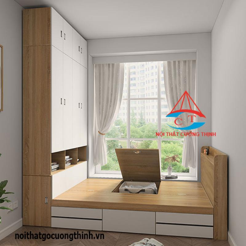 Nội thất đa năng trong một căn phòng của mẫu nhà cấp 4 3 phòng ngủ, bao gồm giường có hộc kéo và bàn làm việc gấp gọn, giúp tiết kiệm diện tích và tăng cường tiện ích