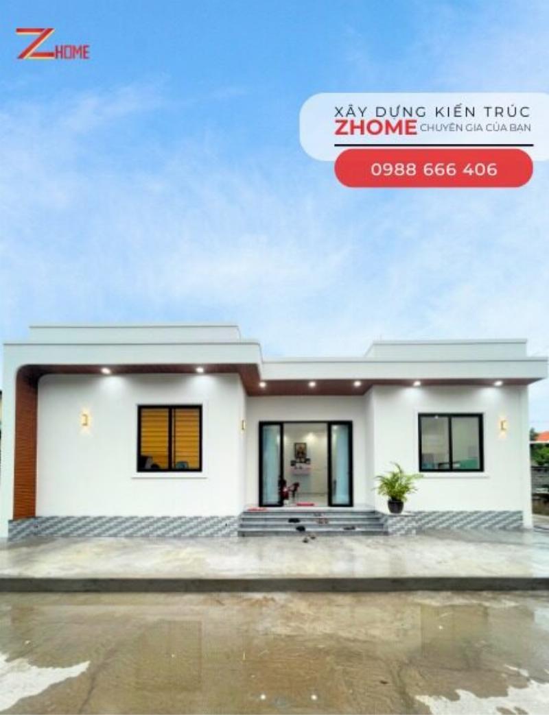 Một phòng khách nhà cấp 4 hiện đại với thiết kế mở, nội thất tông màu sáng, cửa sổ lớn đón ánh sáng tự nhiên, tạo cảm giác rộng rãi và thoáng đãng cho mẫu nhà cấp 4 3 phòng ngủ