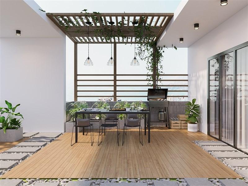 Thiết kế ban công sân thượng đẹp với cây xanh và nội thất ngoài trời